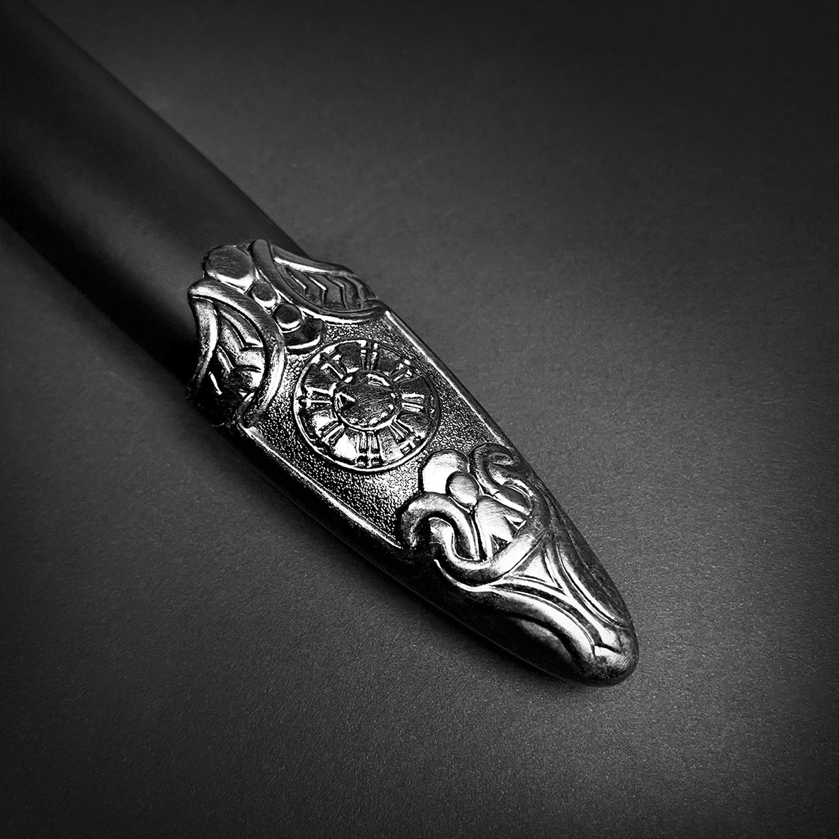 Chivalry one-hand medieval sword with intricately designed hilt and sleek black blade finish