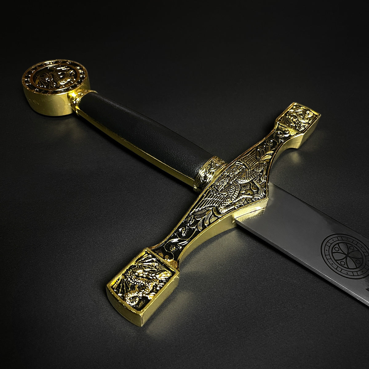 Decorative Excalibur Medieval sword with detailed gold hilt and black leather grip by Knight Collections
