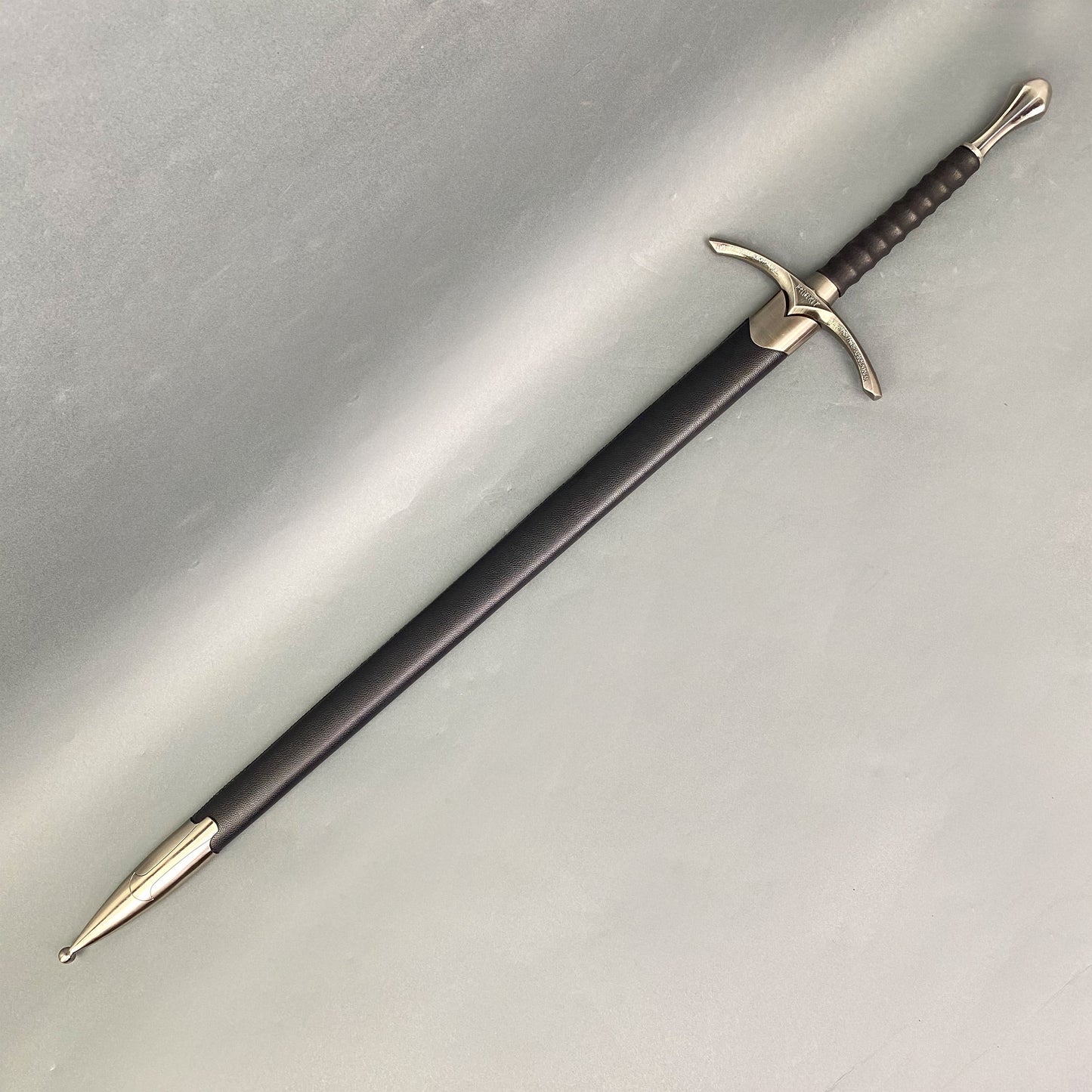 Knight's Collection one-hand sword with hand-forged medieval blade and black leather-wrapped handle