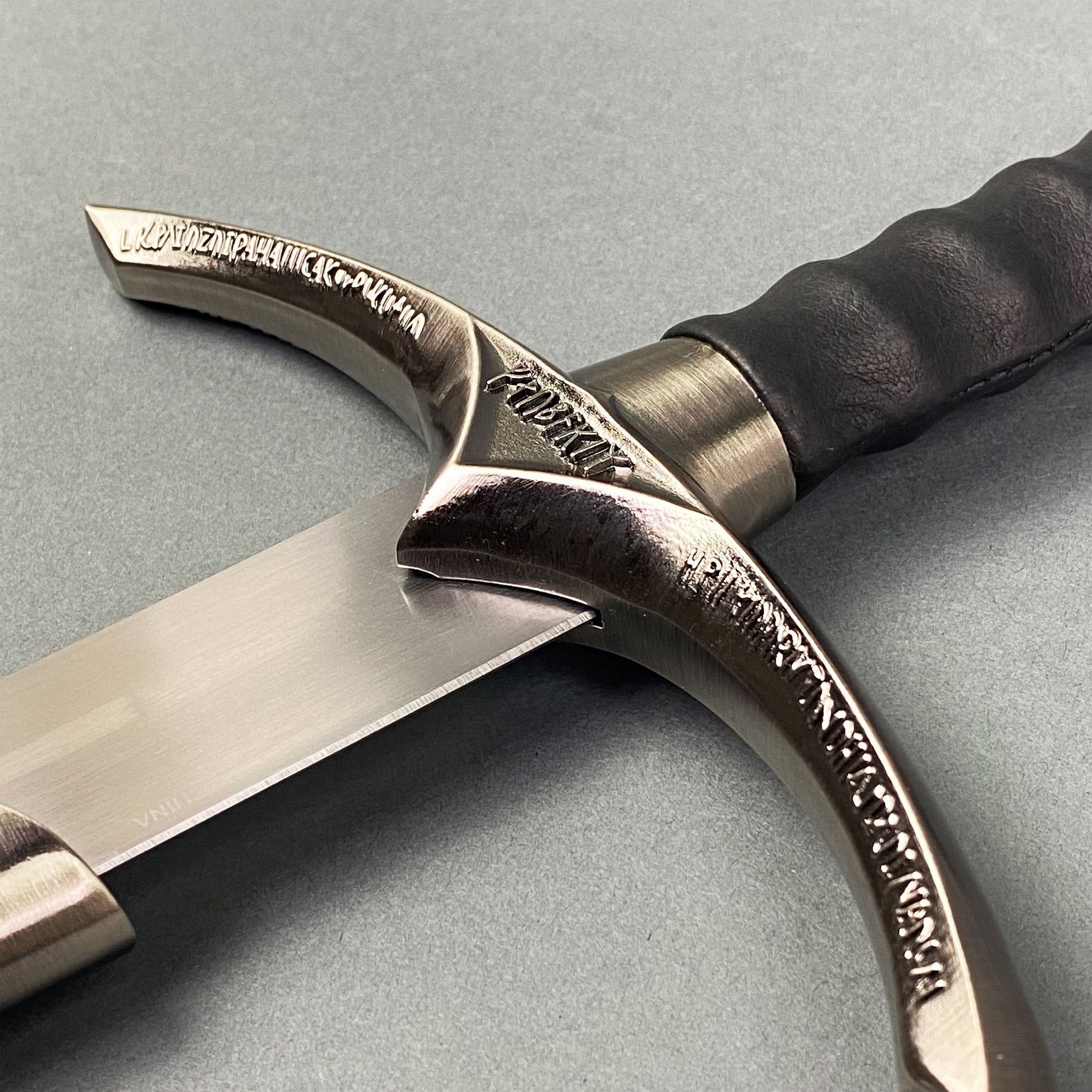 Close-up of one-hand sword from Knight's Collection with hand-forged medieval blade and detailed guard