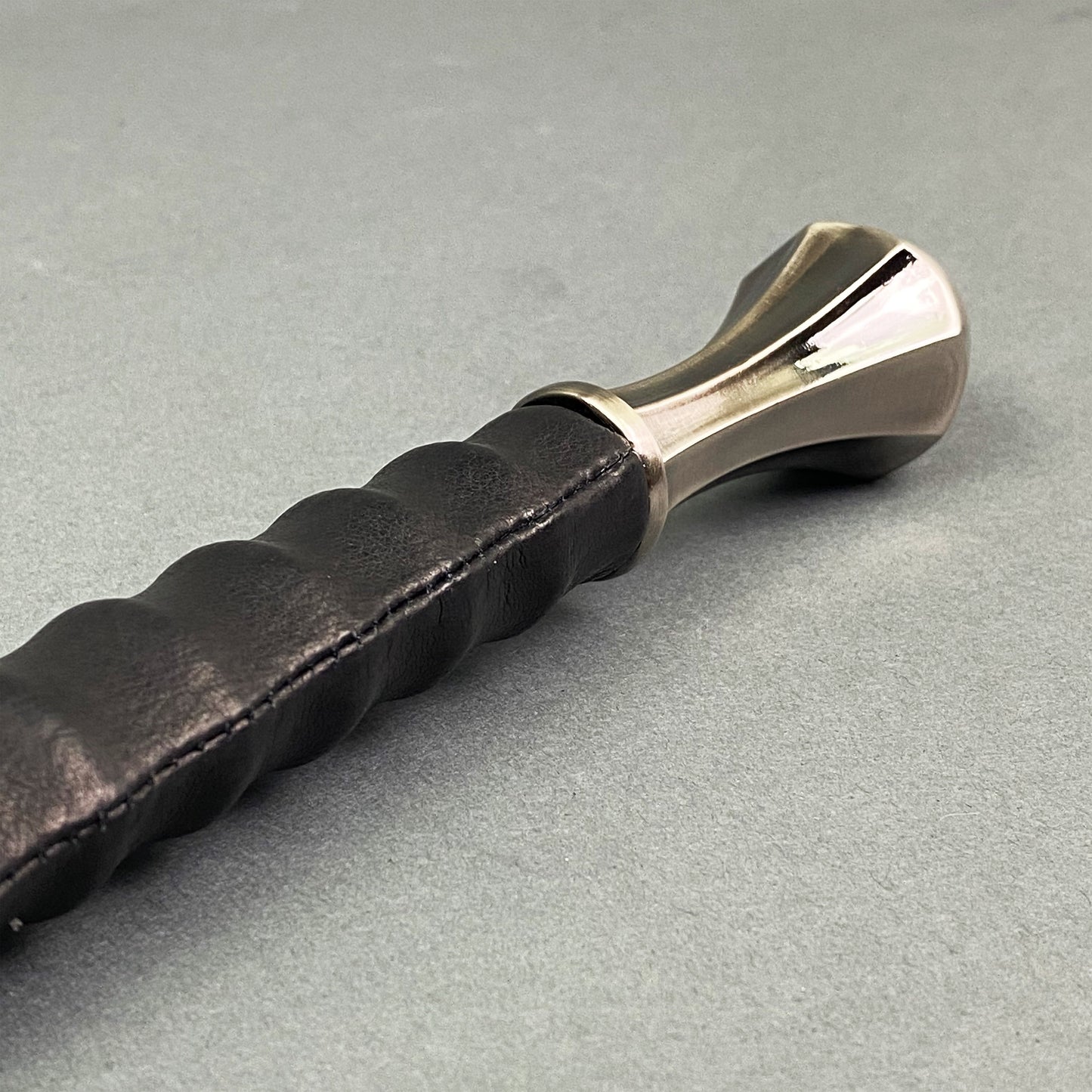 Close-up of Knight's Collection one-hand sword handle with hand-forged medieval blade
