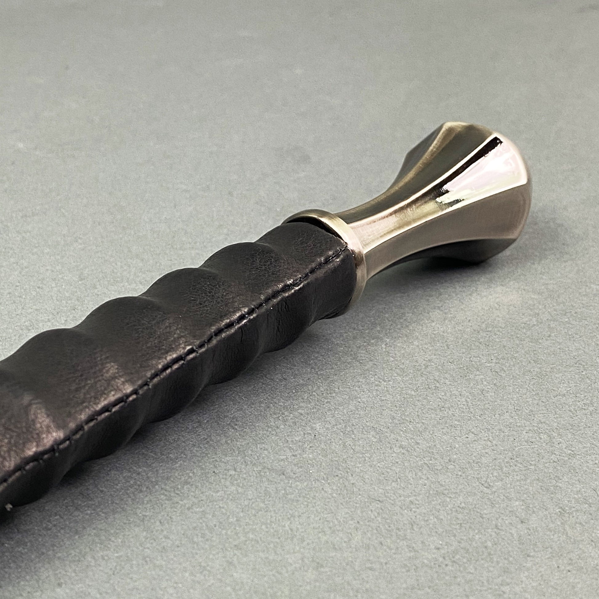 Close-up of Knight's Collection one-hand sword handle with hand-forged medieval blade