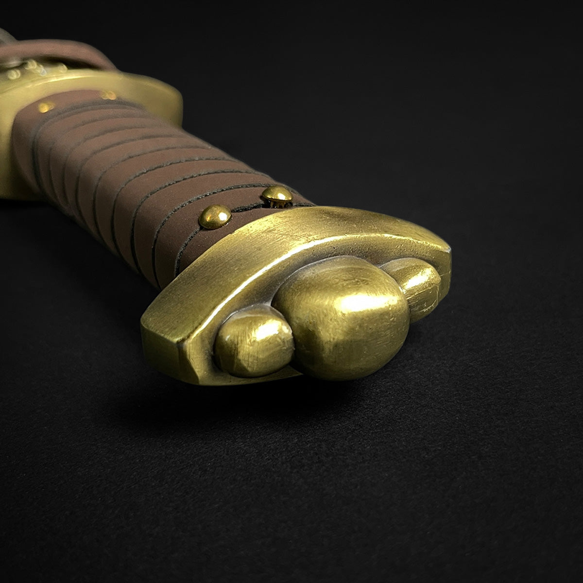 Close-up of Knights Collection Godfrid the Battle-Born Viking Sword handle with detail and craftsmanship