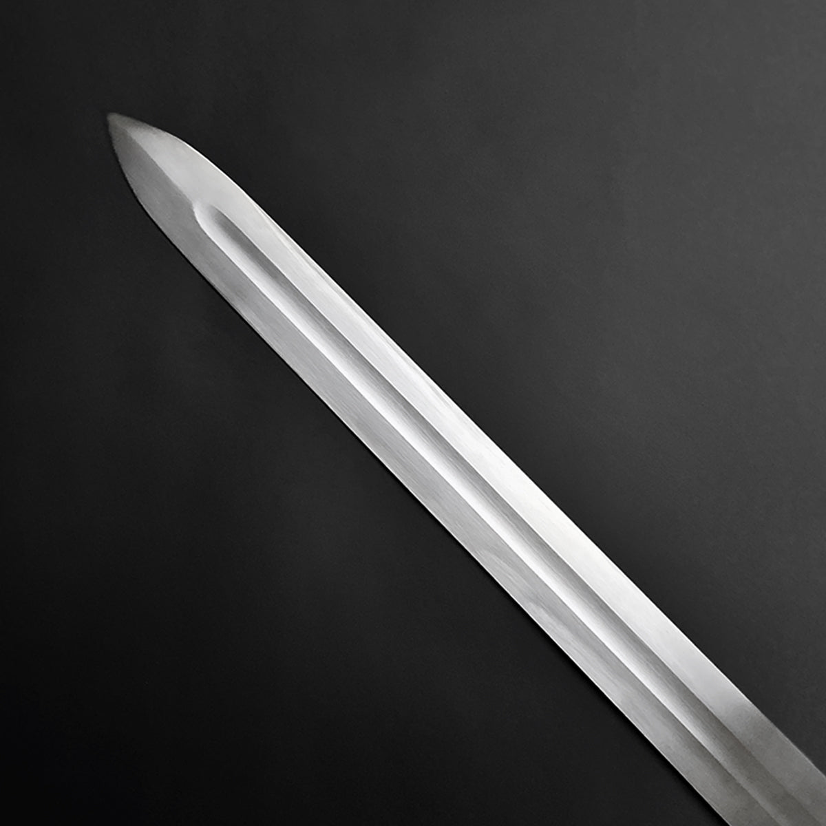 Knights Collection polished blade close up of a hand-forged viking longsword with central fuller