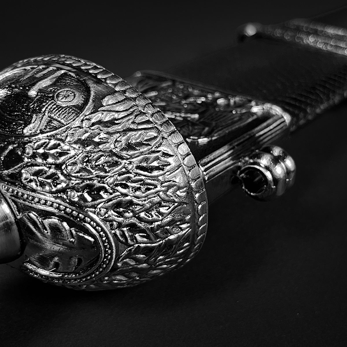 Roman Gladius Medieval Sword ornate silver pommel and textured leather grip close up from Knights Collection for collectors