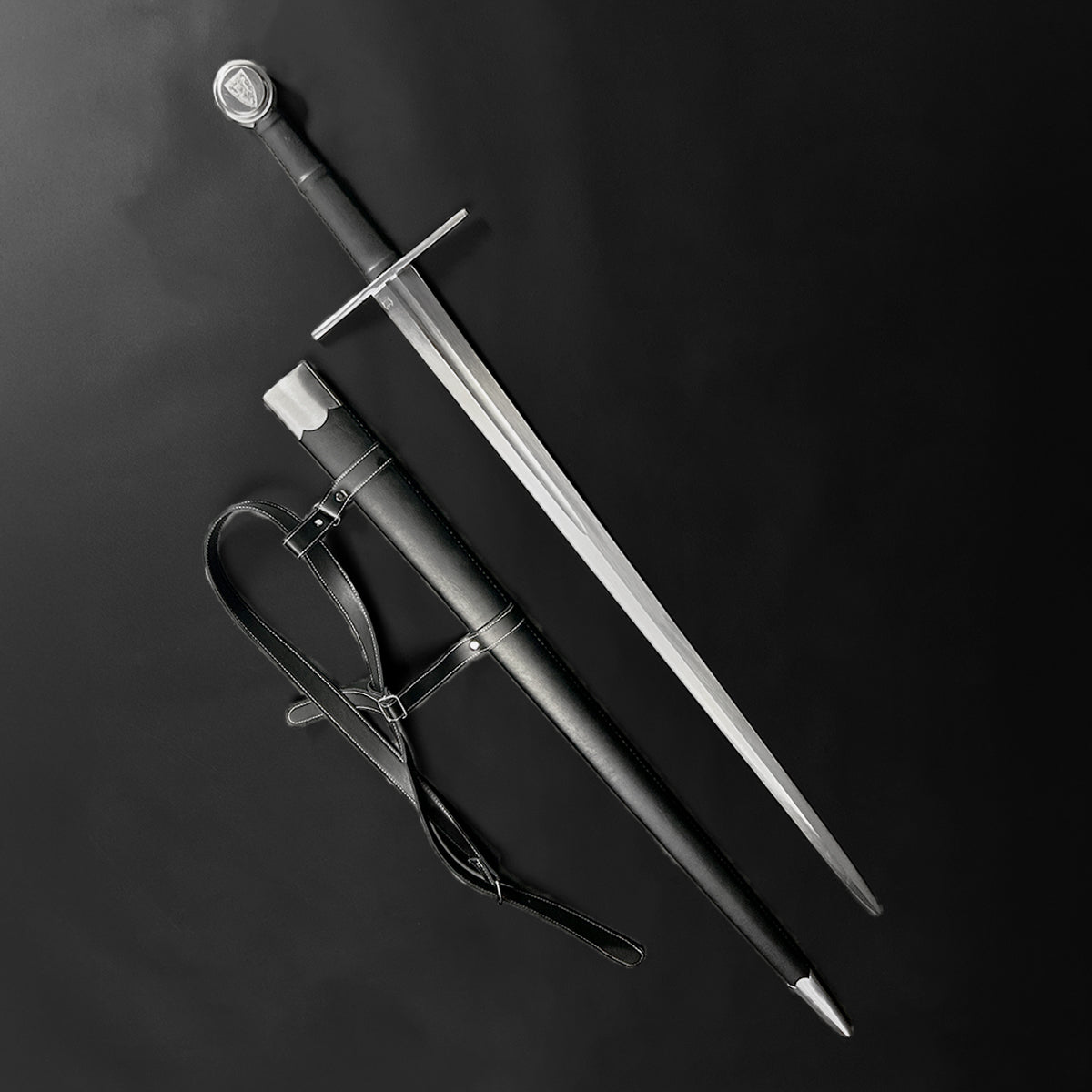Valebrand hand-forged medieval sword with a sleek blade and elegant hilt, includes a leather sheath