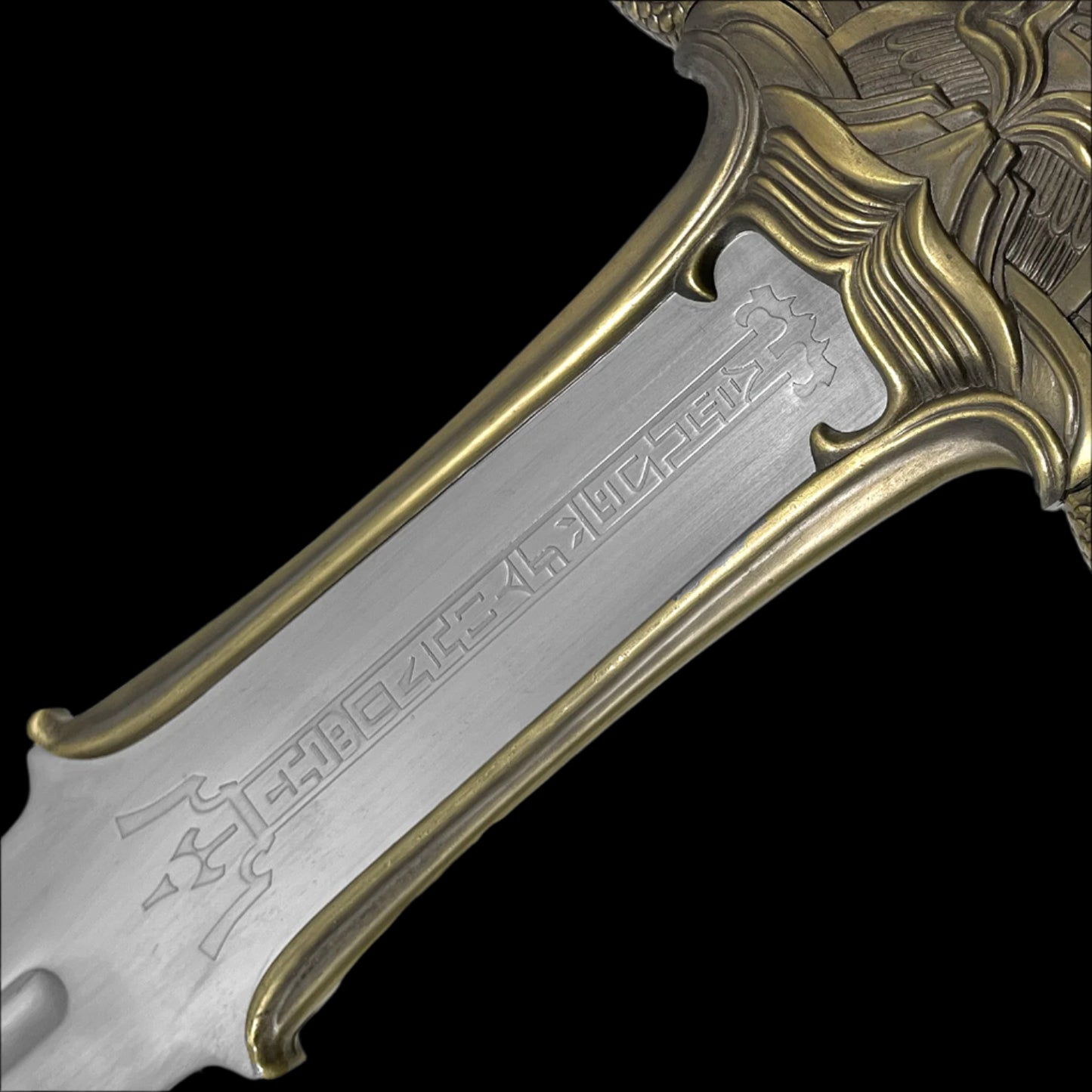 Decorative fantasy Barbarian sword blade with intricate gold and silver detailing from Knight's Collection
