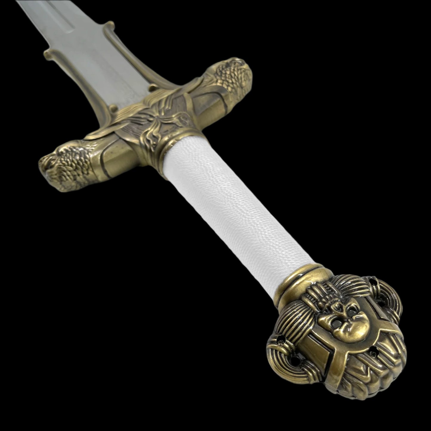 Close-up of Knight's Collection decorative fantasy Barbarian sword handle with detailed lion and beast designs