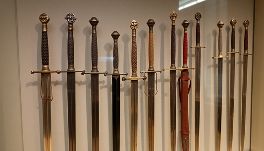 A collection of historic medieval swords on display