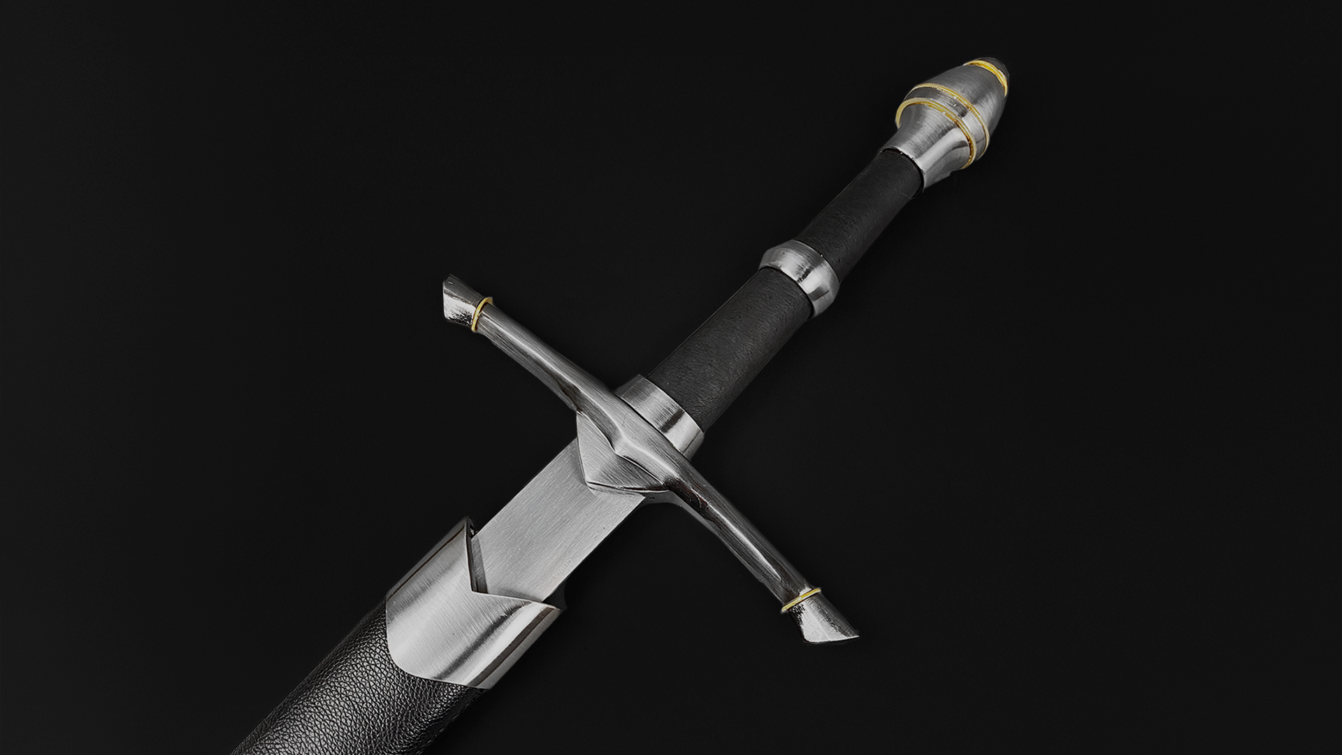 Ornate medieval sword with detailed metal hilt and black grip part of medieval swords for sale collection