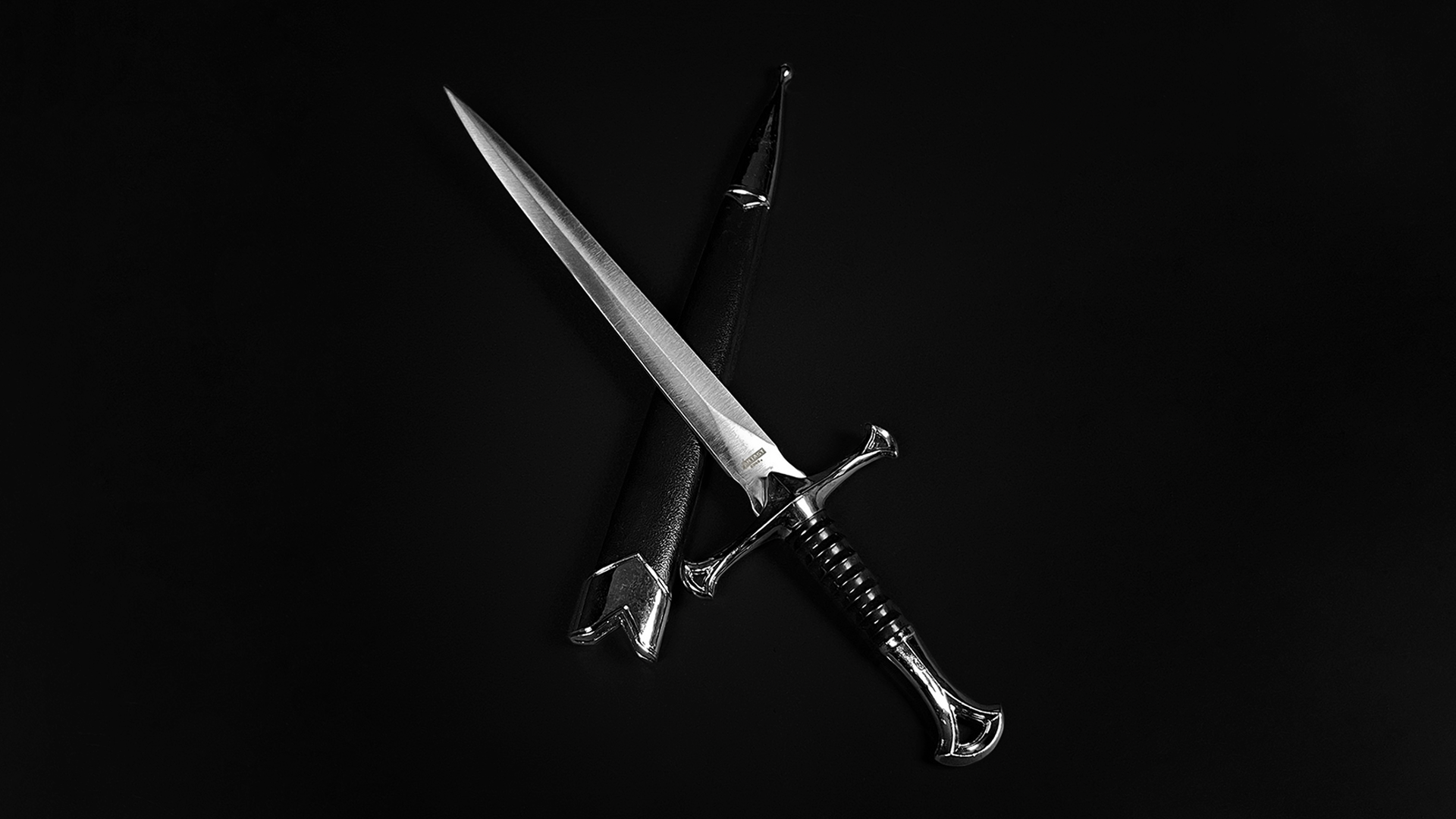Medieval Daggers collection featuring a sleek dagger with ornate hilt and matching sheath for collectors and reenactors