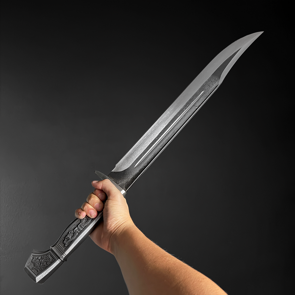 Hand holding large silver survival knife | Knight's Collection