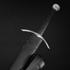 Medieval bastard sword with leather-wrapped grip and crossguard
