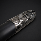 Decorative silver scabbard tip on sheath | Knight's Collection