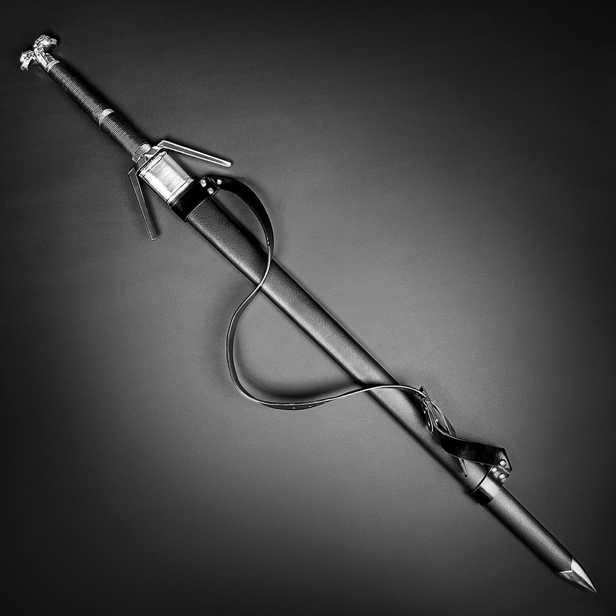 Amphisbaena medieval sword black sheathed longsword with leather shoulder strap ornate crossguard and pommel