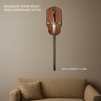 Decorative Excalibur Medieval sword mounted on wood plaque above beige sofa in living room