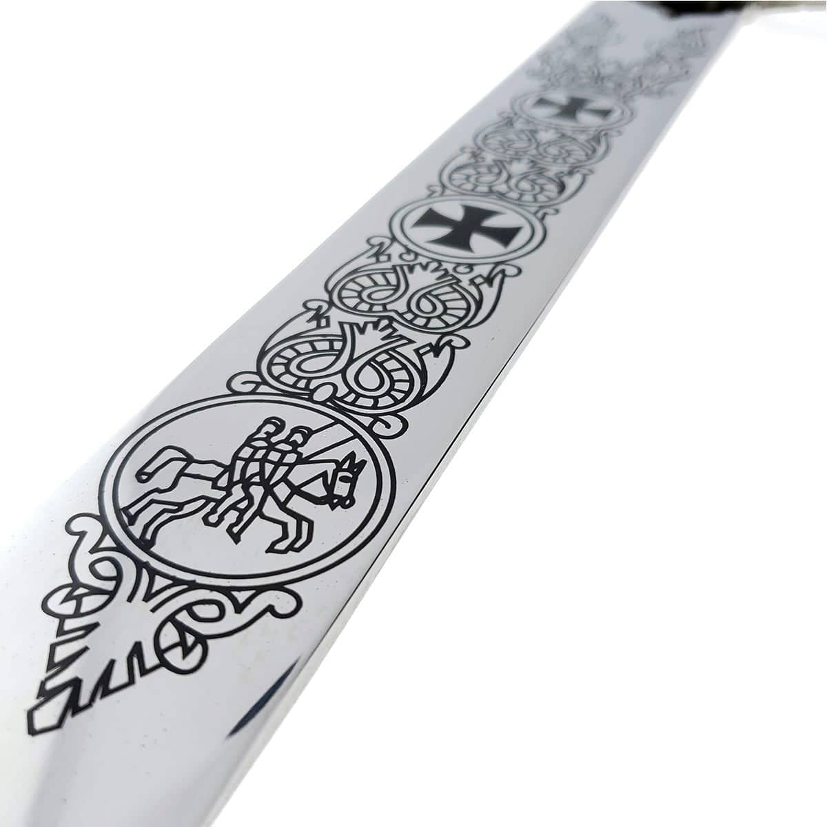 Decorative Knights Templar medieval sword blade close-up with intricate black engravings from Knight Collections