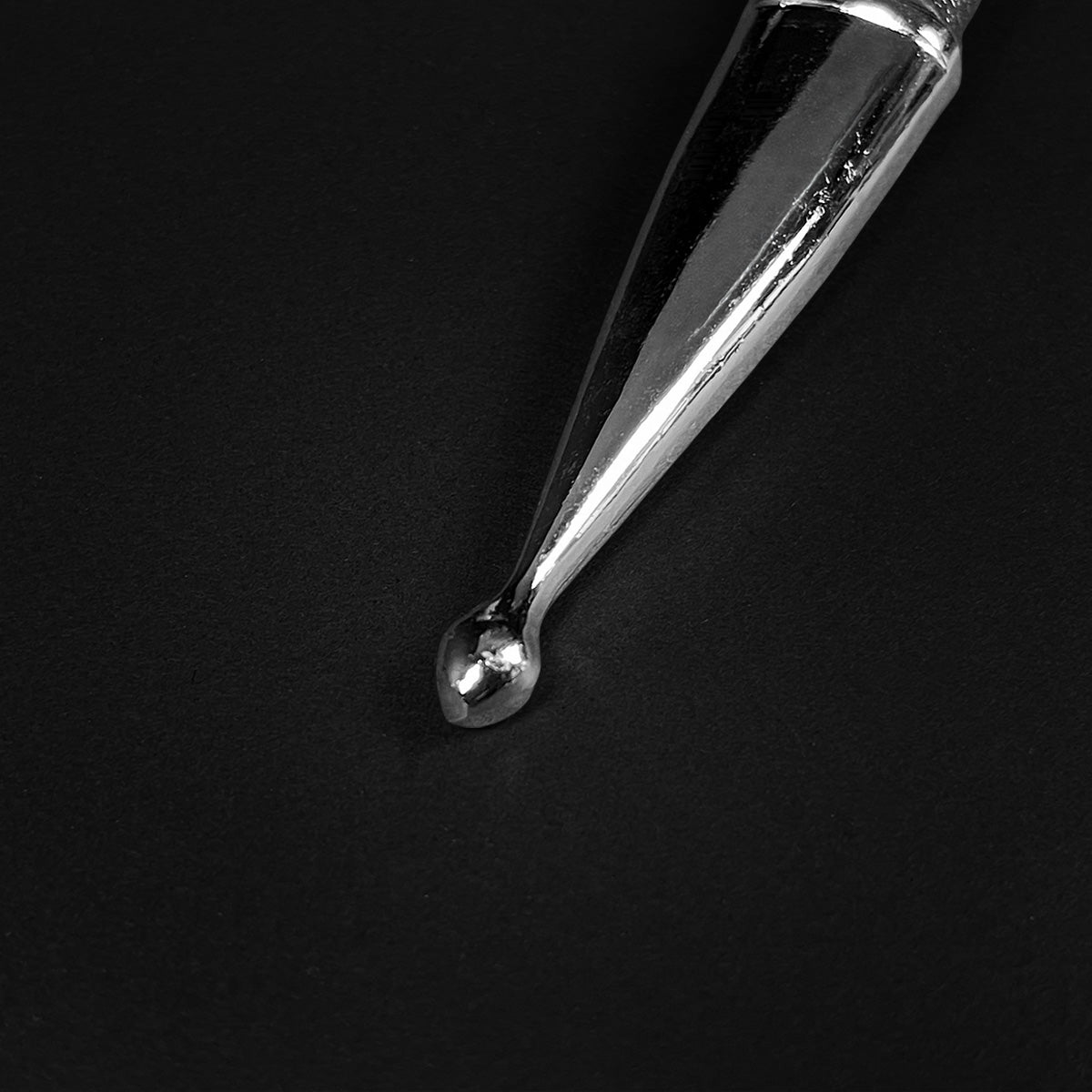 Close-up of the Anduril Dagger by Pacific Solution with a sleek polished blade design