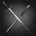 Knight Collections hand-forged battle-ready medieval sword with black handle and matching scabbard on black background