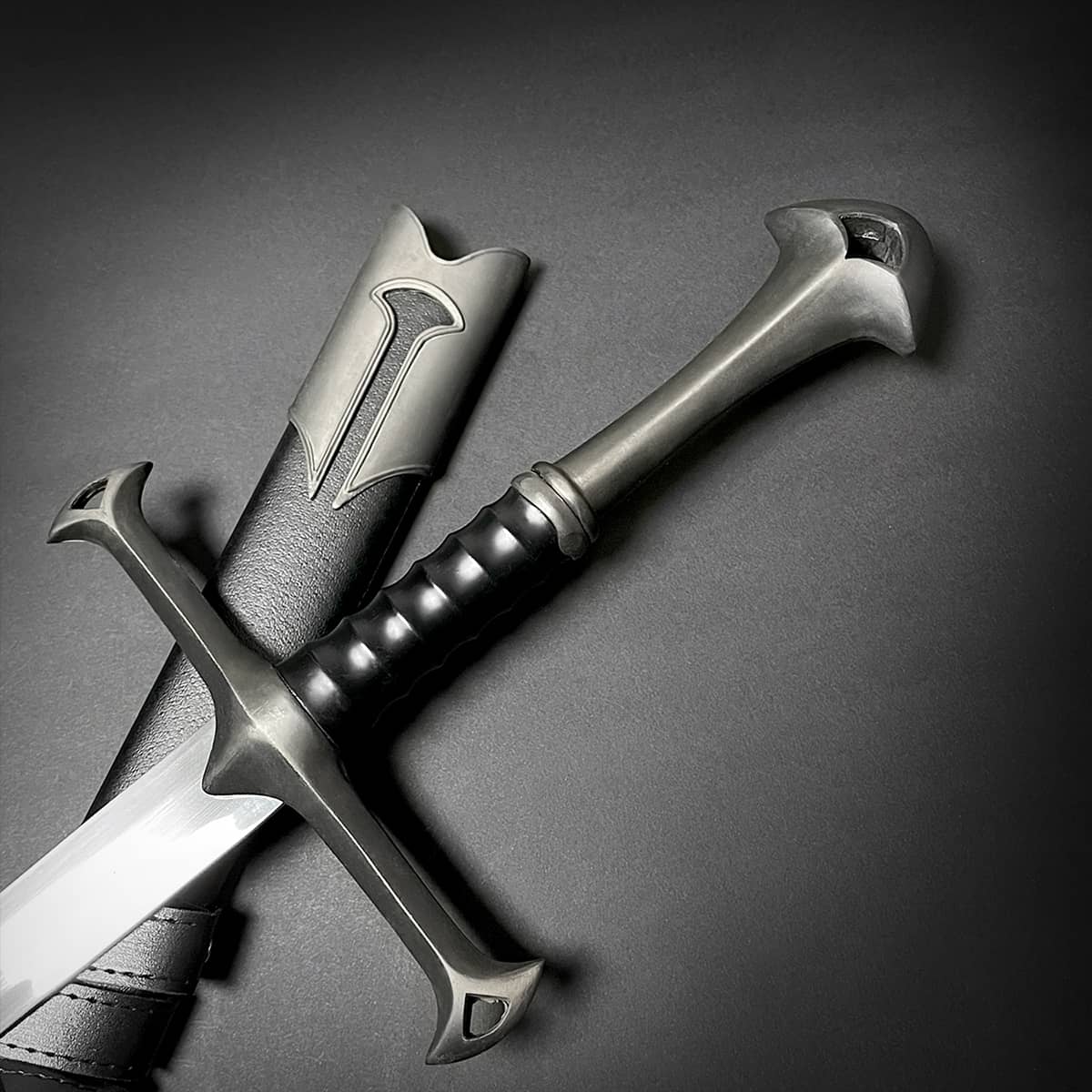 Knight Collections hand-forged battle-ready medieval sword with detailed guard and black leather sheath
