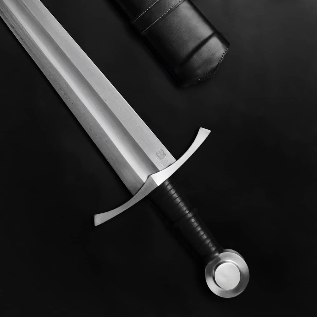 Knights Collection hand-forged damascus medieval sword with double fuller leather wrapped grip and steel crossguard