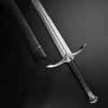 Hand-forged medieval knight sword with a sleek blade and detailed hilt design from Knight's Collection
