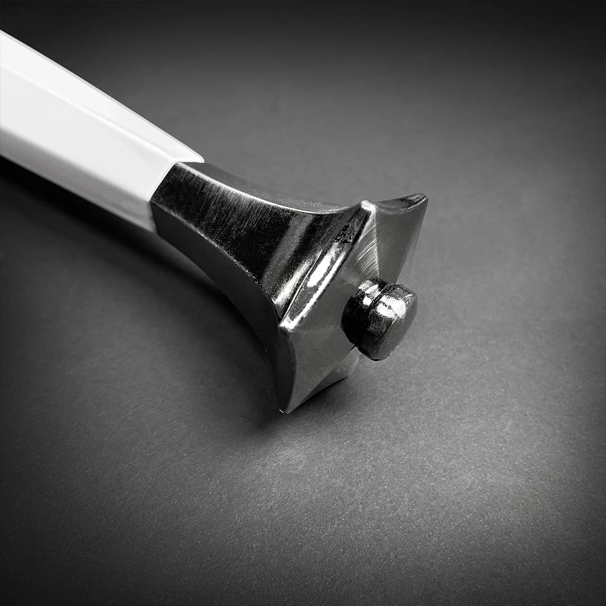 Close-up of the hilt of the Knights Collection White Knight medieval sword with polished details
