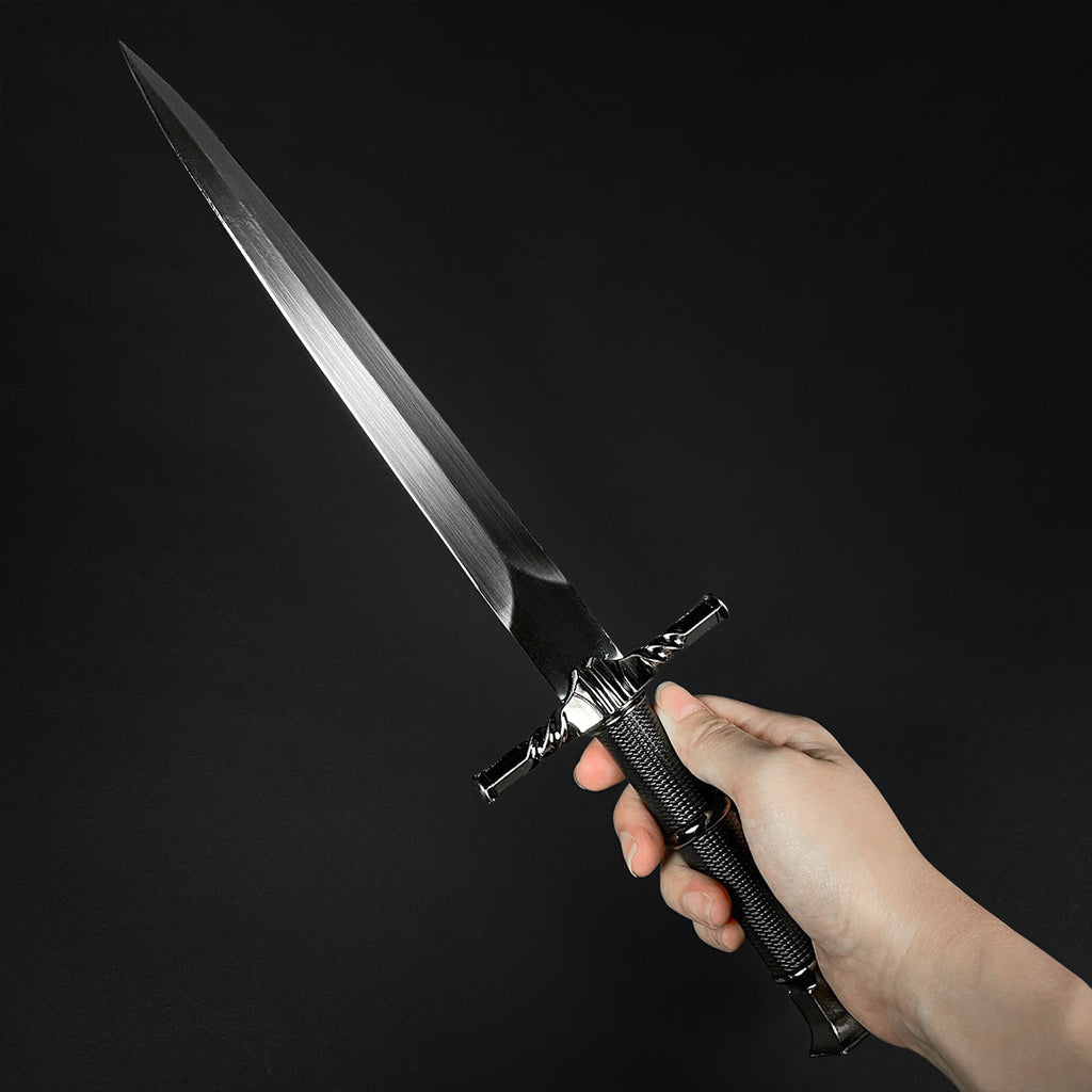 Medieval Dagger with Wolf Ornaments held in hand, featuring a sleek blade and ornate handle