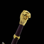 Medieval one hand sword with gold lion head pommel and dark handle from Knight Collections