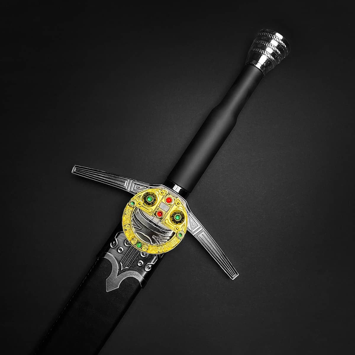 Knights Collection medieval sword for sale with black leather handle, jeweled gold round guard and silver crossguard