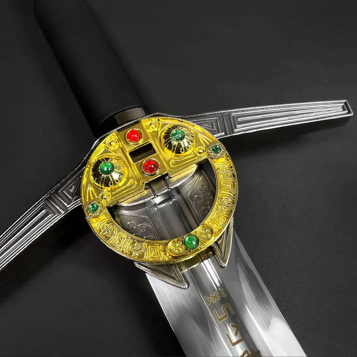 Knights Collection medieval sword for sale ornate gold rondel guard with red and green gems and polished blade
