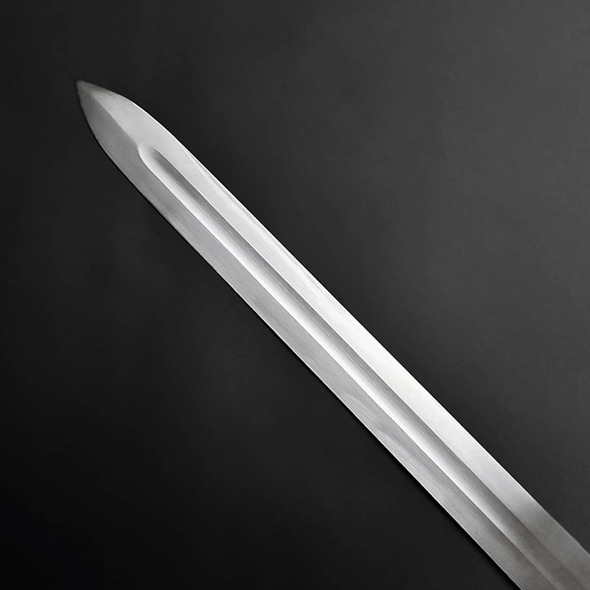 Knights Collection polished blade close up of a hand-forged viking longsword with central fuller