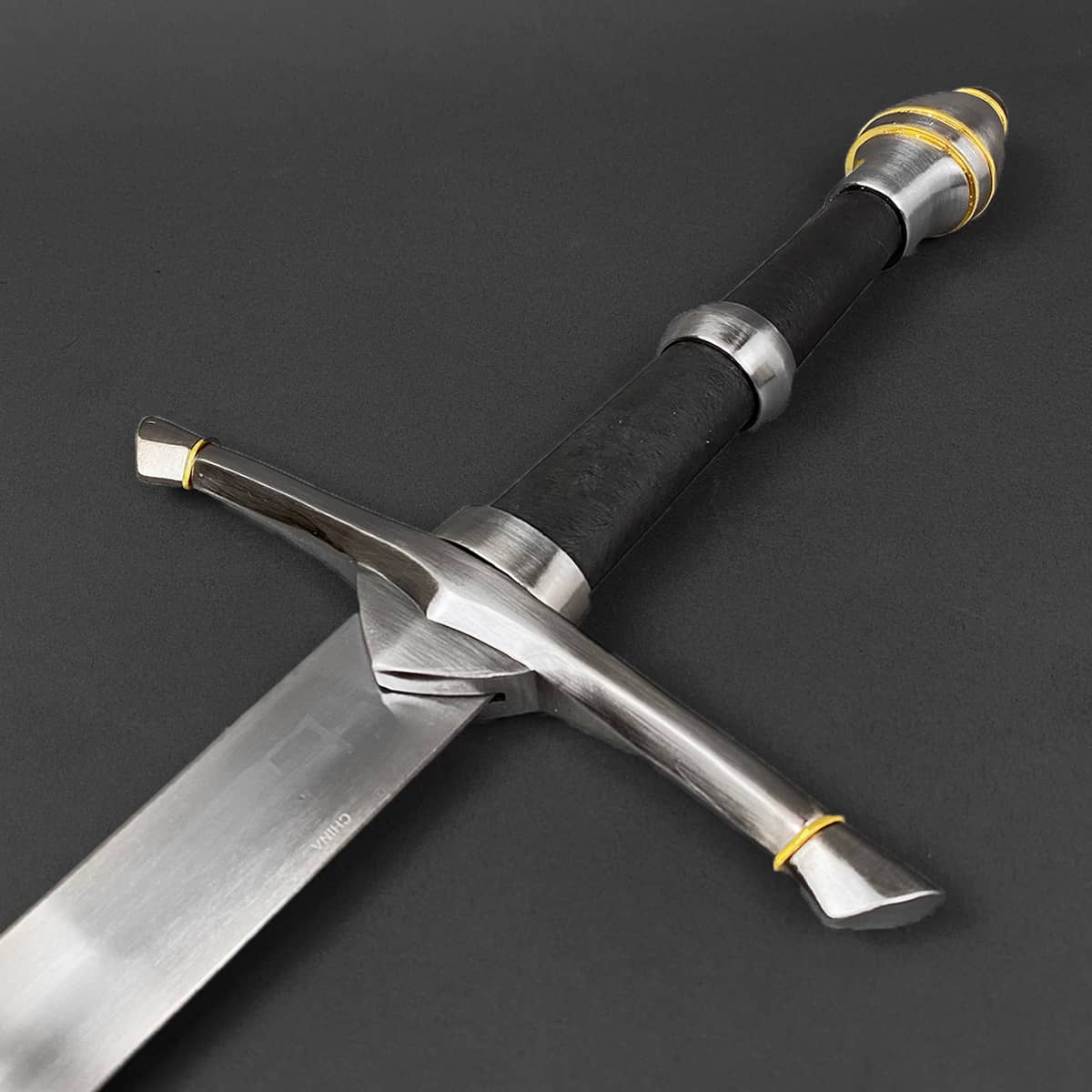 One-Hand Knight Medieval Sword from Knight's Collection with a sleek silver blade and detailed grip