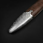 Knights Collection polycephally medieval sword leather scabbard close up showing textured metal chape and brown grip