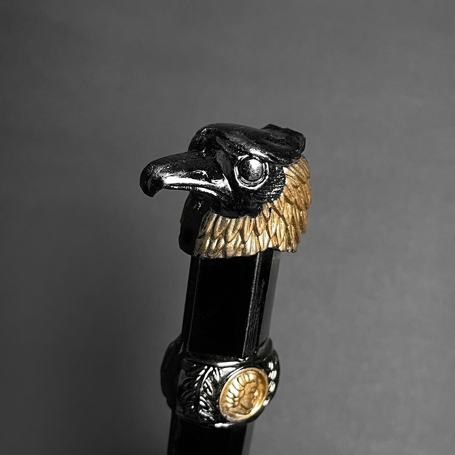 Roman Dagger with intricately designed hilt featuring a raven head motif
