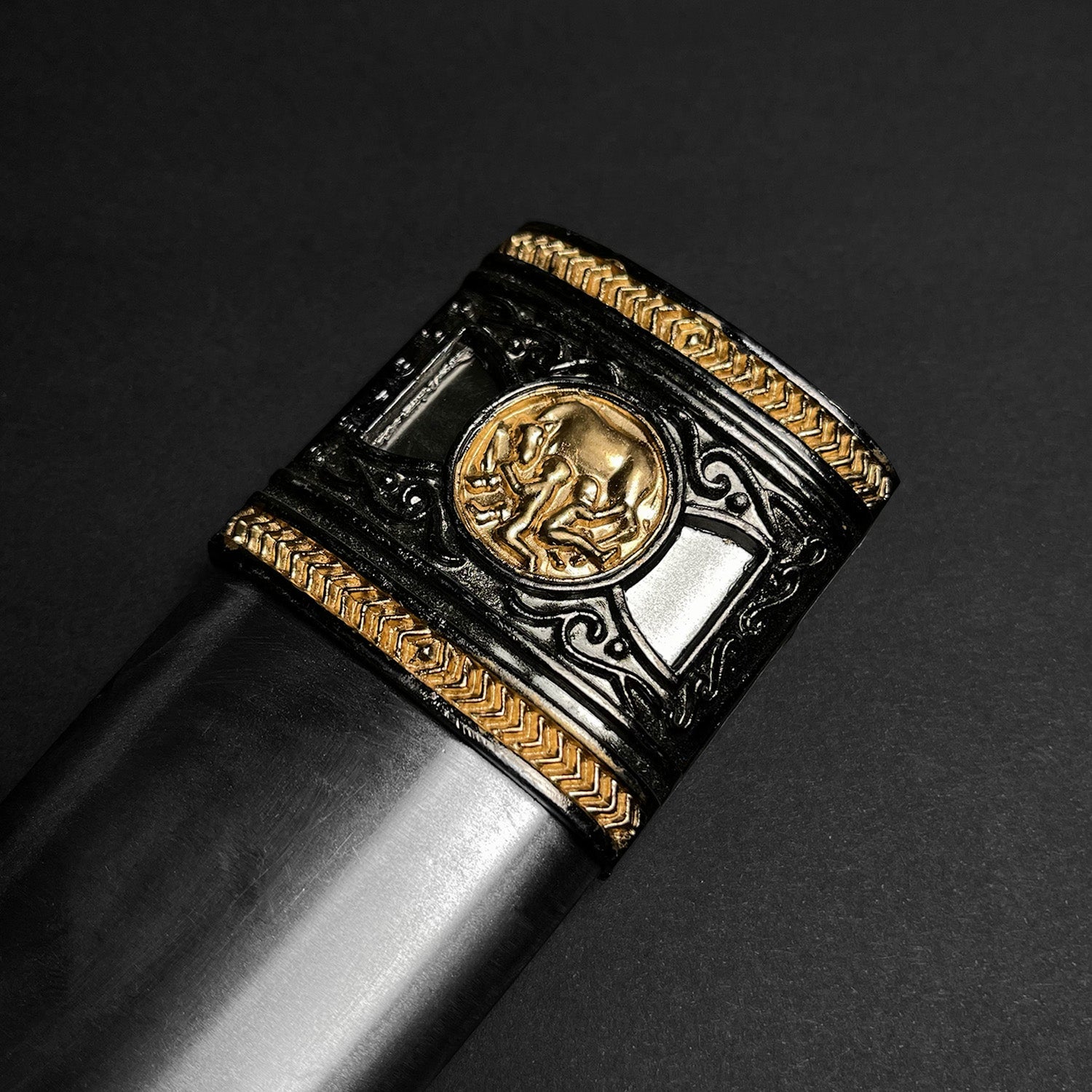 Close-up of a Roman Dagger hilt with intricate gold and black detailing by Pacific Solution