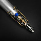  Roman Dagger with Intricate Gold Detailing and Blue Gemstone Accent