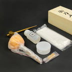 Knight's Collection Sword Cleaning Kit with brushes, oil, and polishing cloth for sword maintenance