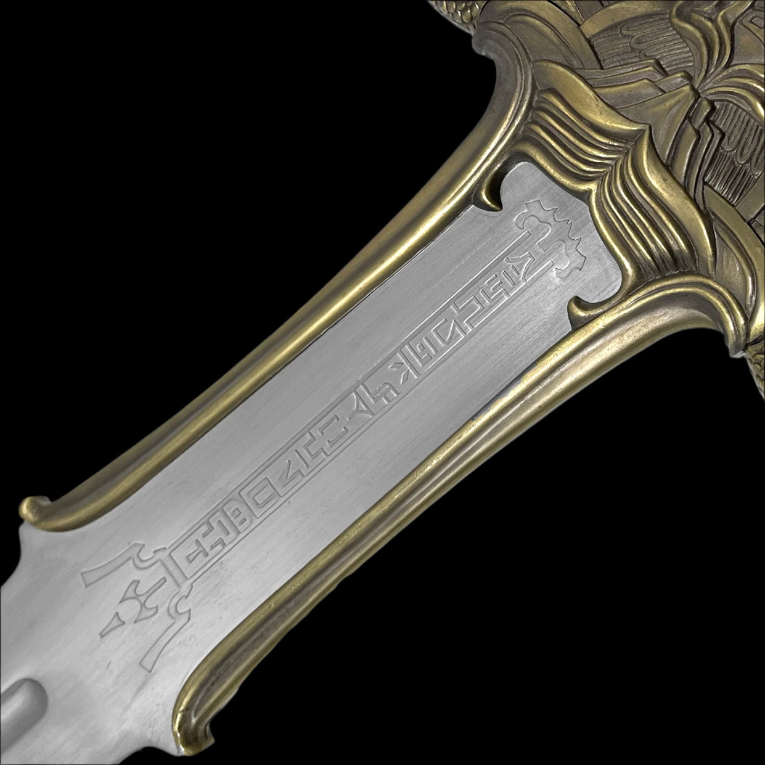 Decorative fantasy Barbarian sword blade with intricate gold and silver detailing from Knight's Collection