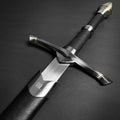 Medieval sword for sale with detailed steel guard and black leather handle from Knight's Collection