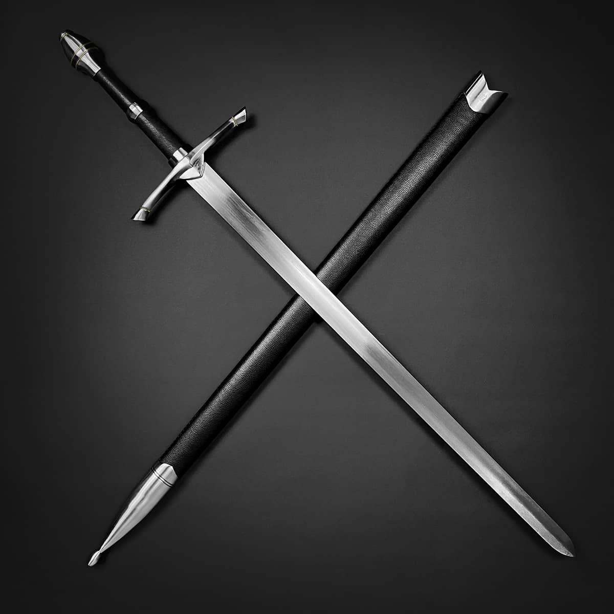 Knight's Collection medieval sword for sale with steel blade and black leather scabbard on black background