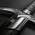 Close-up of the Knight Collections wizard one hand medieval sword with detailed hilt and leather grip